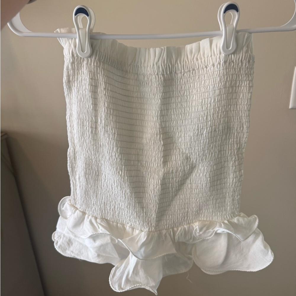 The Impeccable Pig White Smocked Ruffle Skirt